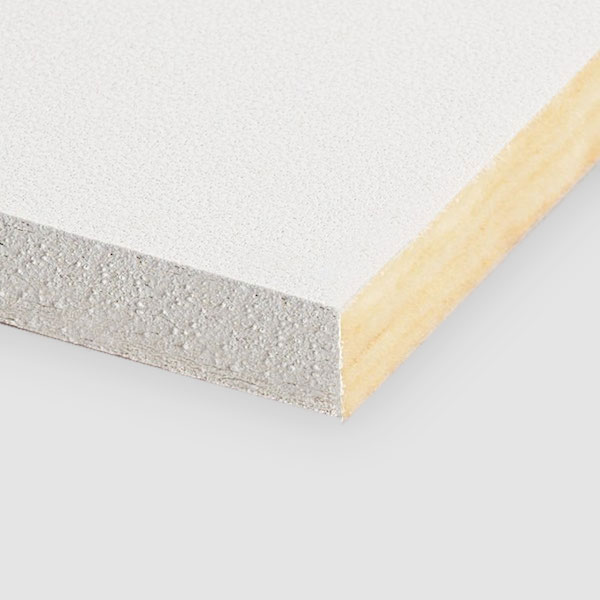 A close-up of the corner of a rectangular white plasterboard panel showing its smooth top surface and layered cross-section with a dense gypsum core and paper backing.